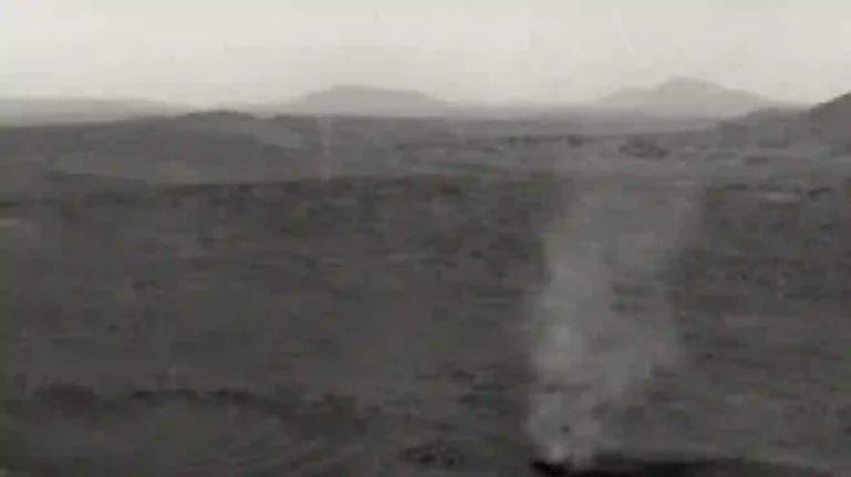 Martian Twister Showdown: NASA Captures Rare Dust Devil Devouring Another